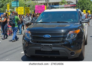 Los Angeles, CA, USA - May 02, 2015: Police Watching Protestants During March Against The Death Of Freddie Gray, A Man Of Baltimore Who Was Seriously Injured In Police Custody.