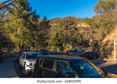 LOS ANGELES, CA, USA - OCTOBER 2, 2016: Parking Area Near Griffith Observatory. Road To The Observatory Of Griffith With A Vehicles On The Side. 