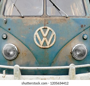 Los Angeles, CA / USA - September 25, 2018: Retro Volkswagon van with vintage rusty VW emblem logo and old dirty scuffs and scratches.