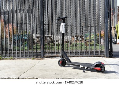 LOS ANGELES, CALIFORNIA - 05 FEB 2020: E-Scooter Abandoned Or Parked On A Sidewalk In Downtown Los Angeles. 