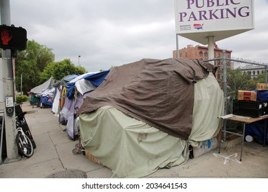 Los Angeles, California. August 17, 2021: Los Angles Homeless Tents and Encampments. Homeless people set up tents on the sidewalks and various locations in Los Angeles to live and sleep. 
