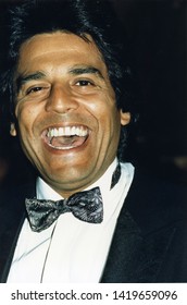 Los Angeles, California - Circa 1990: Closeup Of Actor Erik Estrada Laughing Upon Arrival For A Charity Event