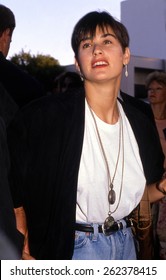 LOS ANGELES, CALIFORNIA - Exact Date Unknown - Circa 1990 - Demi Moore Arriving At A Celebrity Event