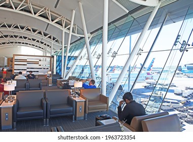 Los Angeles, California - January 19 2019: the Admirals Club at LAX airport offers a comfortable waiting area with great views through full length glass windows of aircraft on the tarmac.