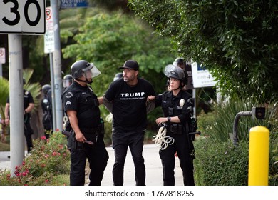 LOS ANGELES, CALIFORNIA - JUNE 1, 2020: Man Being Arrested For A Curfew Violation During A Black Lives Matter Protest.