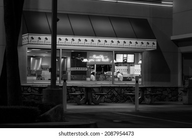 Los Angeles, California - March 28, 2020: Late Night Fast Food Workers At In-N-Out. Black And White.