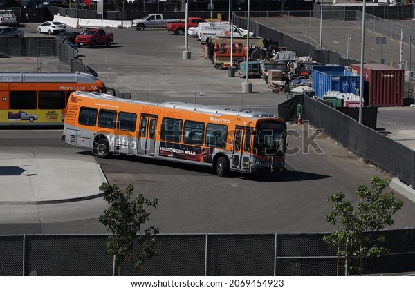 Los Angeles, California, Oct 15\
2021: A LA Metro bus making a turn in the LAX city bus station\
