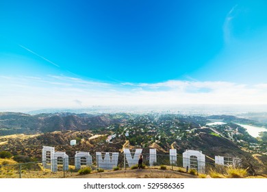 LOS ANGELES, CALIFORNIA - OCTOBER 27, 2016: Hollywood sign seen from behind with Los Angeles on the background
