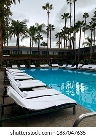 Los Angeles, California United States February 14th 2019: Empty Lounge Chairs At The Hotel Roosevelt Pool, Famously Painted By David Hockney, In Los Angeles, California On Hollywood Boulevard.  