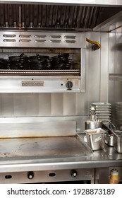 Los Angeles, California, United States - 02-24-2021: A View Inside A Restaurant Kitchen, Featuring Griddle And Broiler Appliances By American Range.