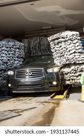 Los Angeles, California, United States - 02-24-2021: A View Of A Car Exiting A Car Wash Facility.