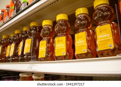Los Angeles, California, United States - 03-18-2021: A view of several containers of Good and Gather honey, on display at a local Target store.