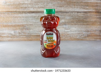 Los Angeles, California, United States - 04-26-2021: A view of a container of Kirkland Signature organic raw honey.