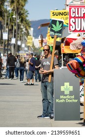 LOS ANGELES, CALIFORNIA, UNITED STATES — March 9, 2011: Man selling medical marihuana at Venice Beach, Santa Monica