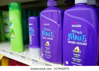 Los Angeles, California, United States - 05-20-2022: A View Of Several Bottles Of Aussie Miracle Moist Hair Products, On Display At A Local Grocery Store.