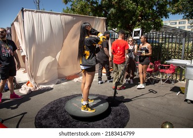 Los Angeles, California, United States - 05-20-2022: A View Of A Girl Using A 360 Degree Social Media Camera, Seen At The Black On The Block Festival.