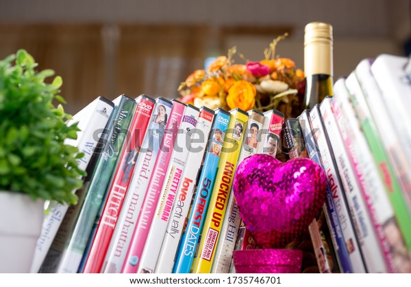 Los Angeles, California, United States -\
05-07-2020: A view of several popular titles of romantic comedy DVD\
movies, in a still life\
setting.