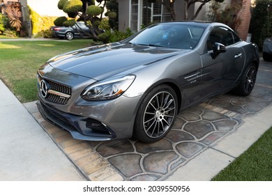 Los Angeles, California, US, October 2020: Super Car Mercedes In The Front Yard. Wealthy Class In The United States. Private House, Own Car, American Dream