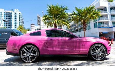 Los Angeles, California USA - April 14, 2021: Ford Mustang GT Luxury Pink Car Side View.