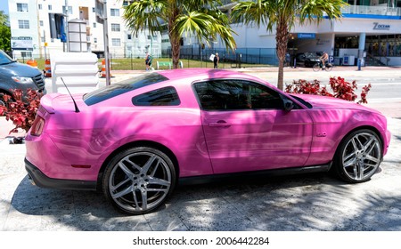 Los Angeles, California USA - April 14, 2021: Ford Mustang GT Luxury Pink Color Car Side View.