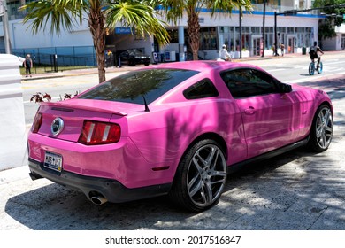 Los Angeles, California USA - April 14, 2021: Ford Mustang GT Luxury Pink Car Parked Back Side View.