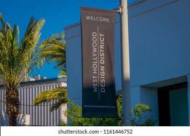 Los Angeles, California, USA, AUGUST, 20, 2018: Outdoor View Of Sunset Blvd Street Sign With Palm Trees In Hollywood, California