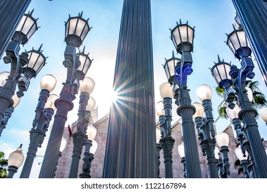 Los Angeles, California / USA - June 23 2018: Urban Lights by Chris Burden featuring two-hundred and two restored cast iron antique street lamps at the Los Angeles Contemporary Art Museum (LACMA). 