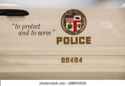 LOS ANGELES, CALIFORNIA, USA - MARCH 2009: Badge of LAPD on the side of a police car in Los Angeles