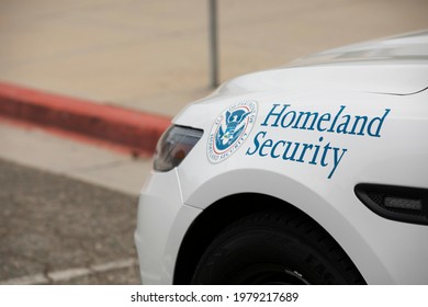 Los Angeles, California, USA - May 15, 2021: A Department Of Homeland Security Cruiser Protects A Federal Building.