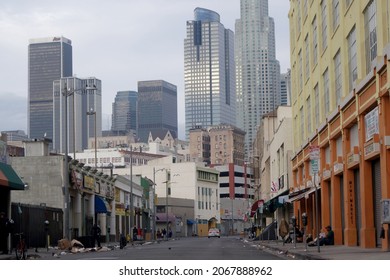 Los Angeles, California, USA - November 30 2014: Homeless in the skid row area of downtown Los Angeles. Wide shot, morning.               
