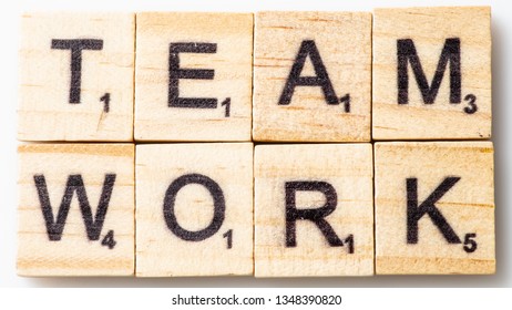 Los Angeles, CA/USA 03/24/2019 Word Team Work In Scrabble Tiles From Above On White Background