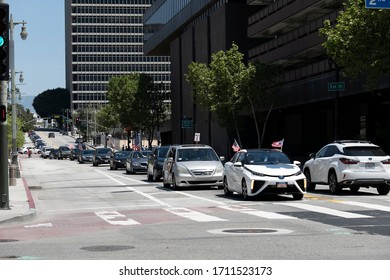 Los Angeles, CA/USA - April 22, 2020: Cars Of Protesters Stretch As Far As You Can See Down Broadway During The Operation Gridlock Coronavirus Protest By City Call