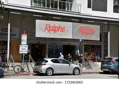 Los Angeles, CA/USA - April 29, 2020: People In Face Masks In Front Of Ralphs Grocery Store In Downtown Los Angeles During COVID-19 Quarantine