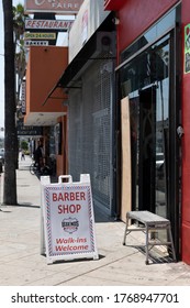 Los Angeles, CA/USA - June 4, 2020: A Barber Shop Struggling To Reopen After Both Coronavirus Quarantine And Black Lives Matter Protests And Looting In The Fairfax District