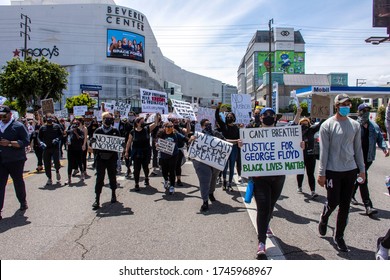 Los Angeles, CA/USA - May 30, 2020: Black Lives Matter Protest In Honor Of George Floyd Near The Beverly Center Shopping Mall In Beverly Hills. Peaceful Protesters Carry Signs On Protest March