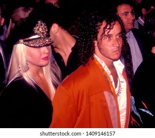 LOS ANGELES - Circa 1991:  Actor Pauly Shore And His Girlfriend Walk Into Roxbury Nightclub.