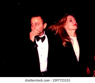 LOS ANGELES  Circa 1991: Actress Michelle Pfeiffer And Boyfriend Fisher Stevens Leave The Four Seasons Hotel.