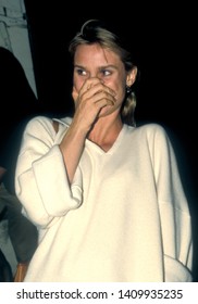 Los Angeles - Circa 1991: Actress Nicollette Sheridan Covers Her Mouth In Surprise Leaving Spago Restaurant.