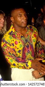 LOS ANGELES - Circa 1991: Boxing Champion Mike Tyson Leaves Le Dome Restaurant.
