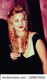 LOS ANGELES - Circa 1991: Drew Barrymore Leaves Roxbury Nightclub.