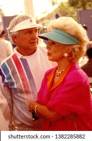 Los Angeles - Circa 1991: Merv Griffin And Eva Gabor At The Riviera Country Club.