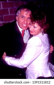 LOS ANGELES - Circa 1991: TV Producer Garry Marshall Hugs His 