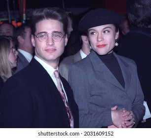 LOS ANGELES - Circa 1992: Actor Jason Priestley And His Girlfriend Christine Elise Leave Spago Restaurant.