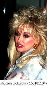 Los Angeles - circa 1992: Singer Dolly Parton arrives at Chasens restaurant.