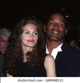 Los Angeles - circa 1993: O.J. Simpson and his girlfriend Paula Barbieri leave Chasen's restaurant.