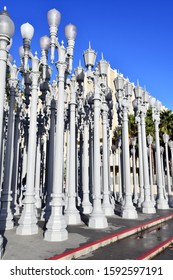 LOS ANGELES CIRCA DECEMBER 2019. Urban Light display, a collection of restored cast iron street lamps created by Chris Burden located at LACMA, Los Angeles County Museum of Art on Wilshire Boulevard