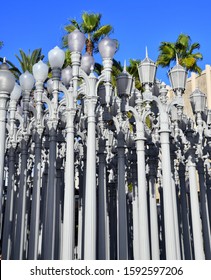 LOS ANGELES CIRCA DECEMBER 2019. Urban Light display, a collection of restored cast iron street lamps created by Chris Burden located at LACMA, Los Angeles County Museum of Art on Wilshire Boulevard