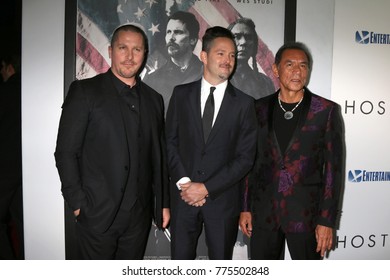 LOS ANGELES - DEC 14:  Christian Bale, Scott Cooper, Wes Studi At The 