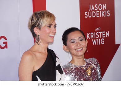 LOS ANGELES, DEC 18, 2017: Kristen Wiig And Hong Chao At The Los Angeles Premiere Of Downsizing.