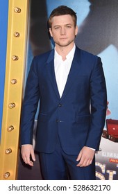 LOS ANGELES - DEC 3:  Taron Egerton Arrives To The 